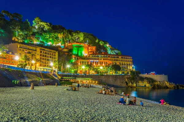 Night view of people on a beach in Nice, Franc