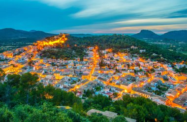 Night aerial view of Capdepera castle and Capdepera town, Mallorca, Spai clipart