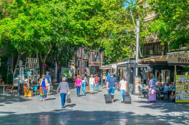 PALMA DE MALLORCA, SPAIN, MAY 18, 2017: People are strolling at Placa de Espana at Palma de Mallorca, Spai
