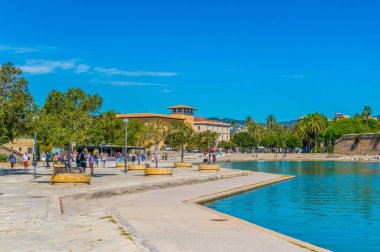 PALMA DE MALLORCA, SPAIN, MAY 18, 2017: People are strolling through Parc de la Mar at Palma de Mallorca, Spai