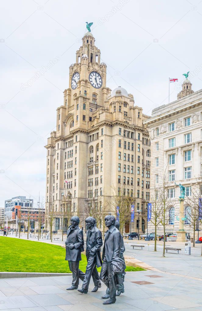 Statue of the Beatles in front of the royal liver building in Liverpool, Englan