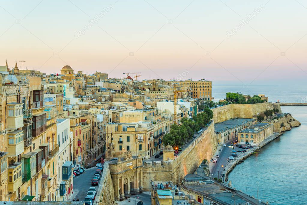 Sunset view of Valletta viewed from the upper barrakka gardens, Valletta, Malt