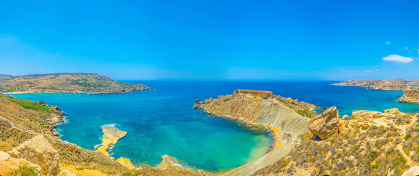 View of a peninsula separating Ghajn Tuffieha and Gnejna bays on Malt