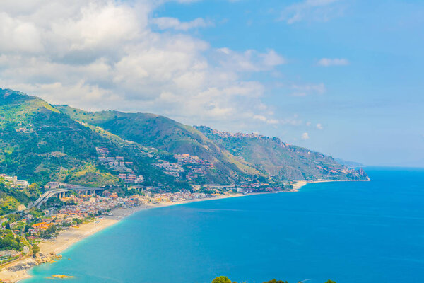 Aerial view of coastline near sicilian city Taormina, Ital