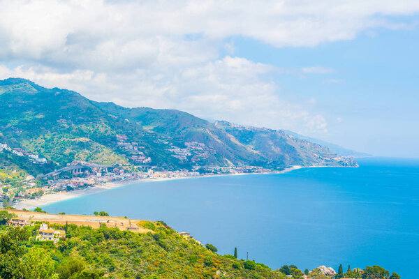 Aerial view of coastline near sicilian city Taormina, Ital
