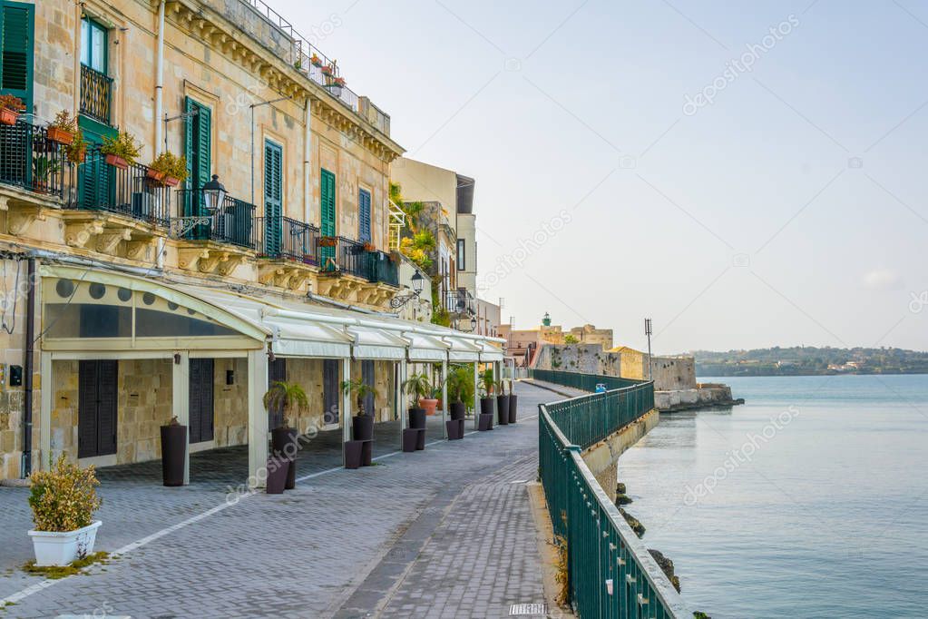 View of the seaside promenade surrounding the old town of Syracuse in Sicily, Ital