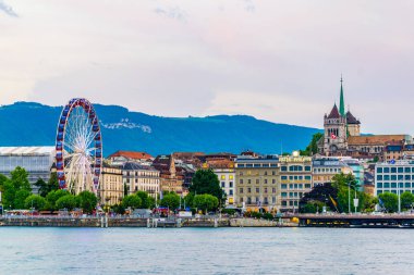 GENEVA, SWITZERLAND, JULY 20, 2017: Cityscape of Geneva dominated by Saint Pierre Cathedral, Switzerlan clipart