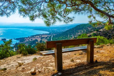 Bench overlooking Akamas peninsula on Cypru clipart