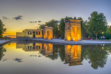Sunset view of temple of debod in Madri clipart
