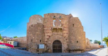 AQABA, JORDAN, JANUARY 5, 2019:Sunset view of Aqaba castle in Jordan clipart