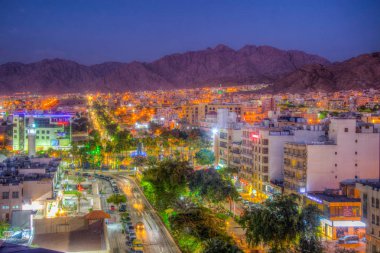 AQABA, JORDAN, DECEMBER 31, 2018: Sunset view of Aqaba, Jordan clipart