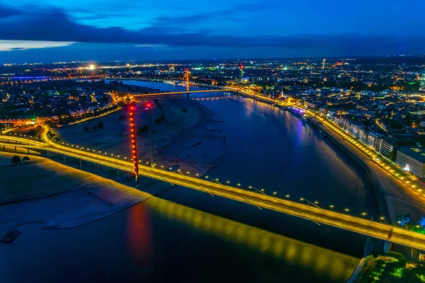 Sunset aerial view of Dusseldorf with Rheinkniebrucke bridge in — Stock Photo, Image