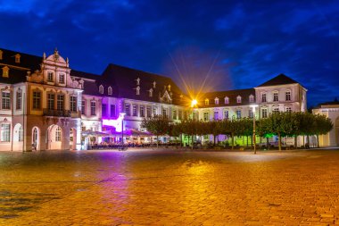 TRIER, GERMANY, AUGUST 14, 2018: Night view of Domfreihof square