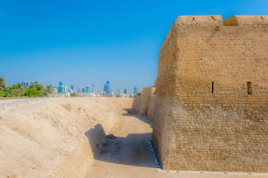 View of the Bahrain fort complex with the Qal'At Al Bahrain fort which is part of UNESCO World Heritage clipart