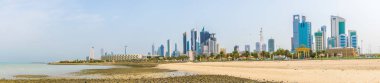 Skyline of Kuwait including the Seif palace, Liberation tower and the National assembly building. clipart