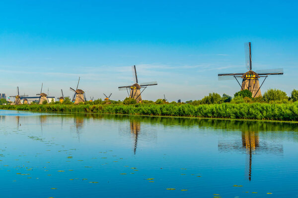 Kinderdijk windmills viewed during sunny summer day, Rotterdam, 