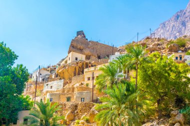 View of a village in the wadi tiwi in Oman. clipart