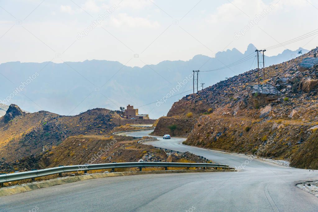 view of a road leading to the Jebel Shams in Hajar mountains in Oman.
