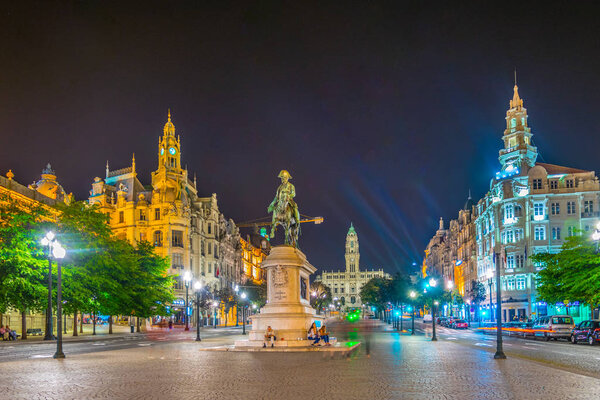 Night view of the Statue of Dom Pedro IV and the town hall of Porto, Portugal.