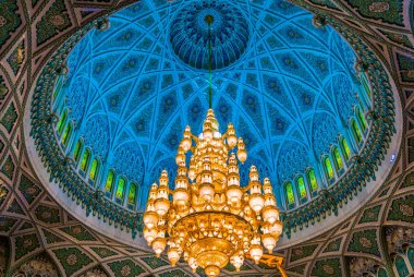 MUSCAT, OMAN, NOVEMBER 1, 2016: Chandelier of the Sultan Qaboos Grand Mosque in Muscat, Oman clipart