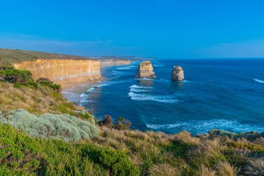 Port Campbell Ulusal Parkı 'nda gün batımında izlenen 12 havari rock sütunları, Avustralya
