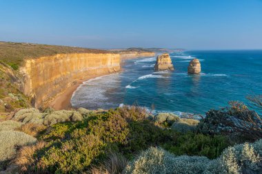 Port Campbell Ulusal Parkı 'nda gün batımında izlenen 12 havari rock sütunları, Avustralya