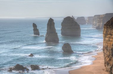 Port Campbell Ulusal Parkı 'nda gün batımında izlenen 12 havari rock sütunları, Avustralya