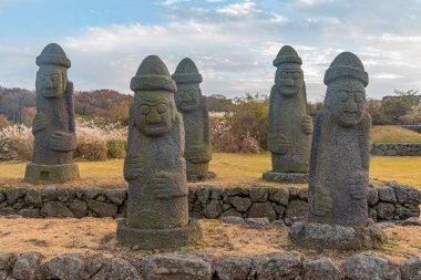 Dol hareubang statues at Jeju stone park, Republic of Korea clipart
