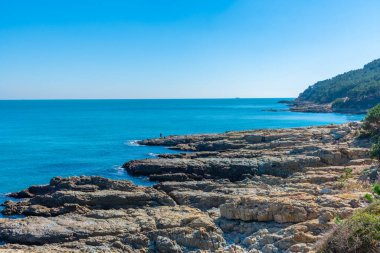 Kore, Busan 'daki Igidae' nin yırtık pırtık kıyıları.