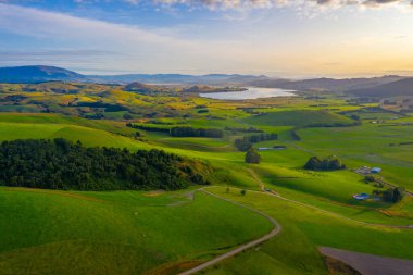 Aerial view of lake Waihola in New Zealand clipart