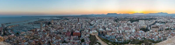 Sunset view of Spanish city and port Alicant