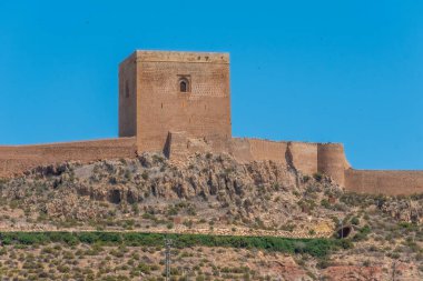Castle in lorca overlooking the town, Spain clipart