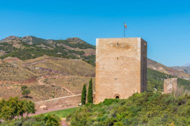 Torre del Espolon inside of the Lorca castle in Spain clipart