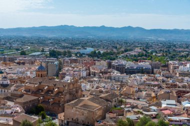 Aerial view of San Patricio Collegiate in Spanish town Lorca clipart