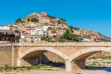 Lorca castle viewed from behind Guadalentin river, Spain clipart