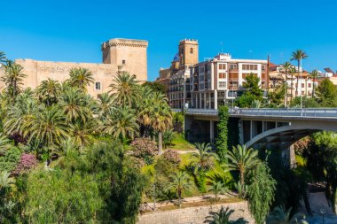 Altamira palace viewed behind river Vinalopo in Elche, Spain clipart