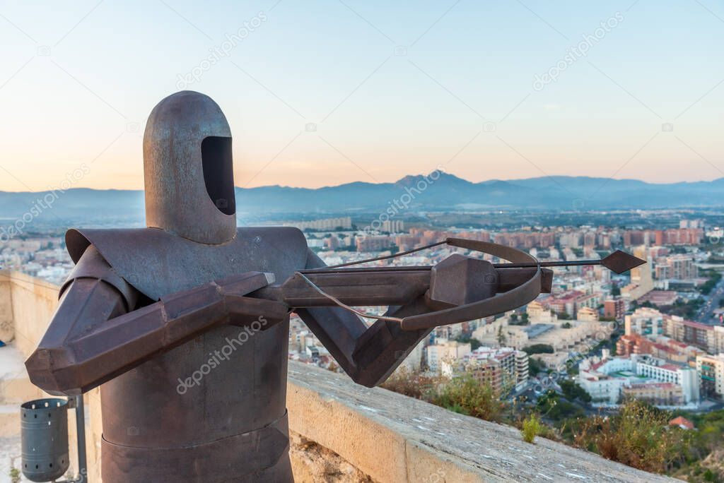 Statue of a solider with crossbow at Castle of Santa Barbara in Alicante, Spain