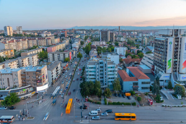 PRISHTINA, KOSOVO, SEPTEMBER 16, 2019: Sunset view of Deshmoret e Kombit boulevard in Prishtina, Kosovo