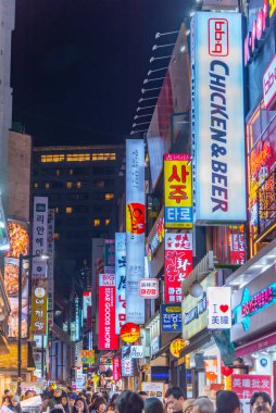 SEOUL, KOREA, NOVEMBER 9, 2019: Colorful signs at Myeongdong district of Seoul, Republic of Korea clipart