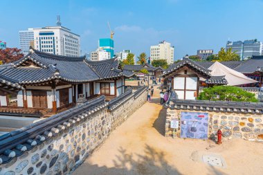 SEOUL, KOREA, OCTOBER 20, 2019: Traditional houses at Namsangol Hanok Village at Seoul, Republic of Korea clipart