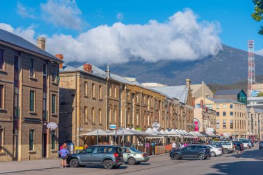 HOBART, AUSTRALIA, FEBRUARY 22, 2020: People strolling on Salamanca street in Hobart, Australia clipart