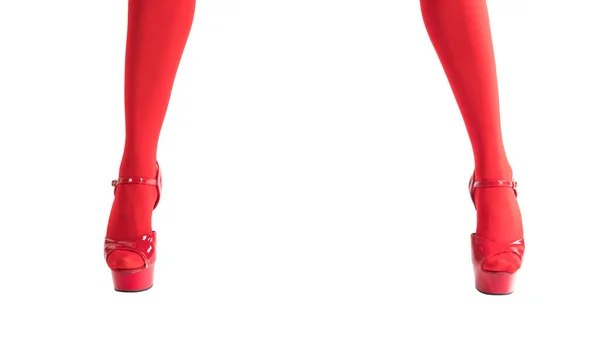 Σέξι γυναικεία πόδια φετίχ κόκκινες κάλτσες και κόκκινο τακούνια, απομονωμένα σε λευκό, Χριστούγεννα και νέο έτος έννοια — Φωτογραφία Αρχείου
