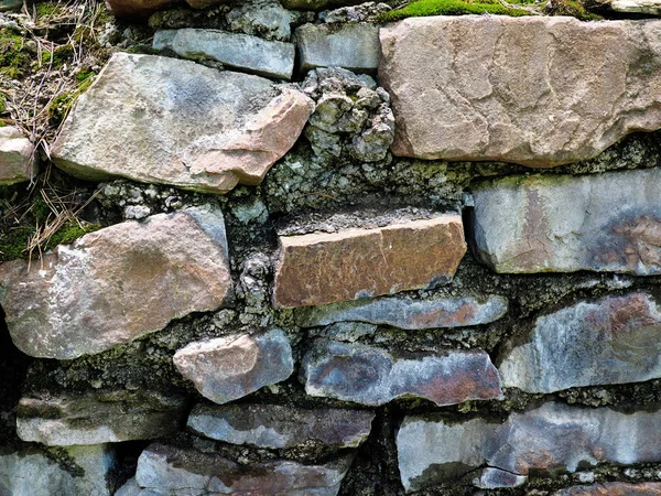 Ściana kamień stary dom, stary mur. Tekstura, kamieniarka — Zdjęcie stockowe