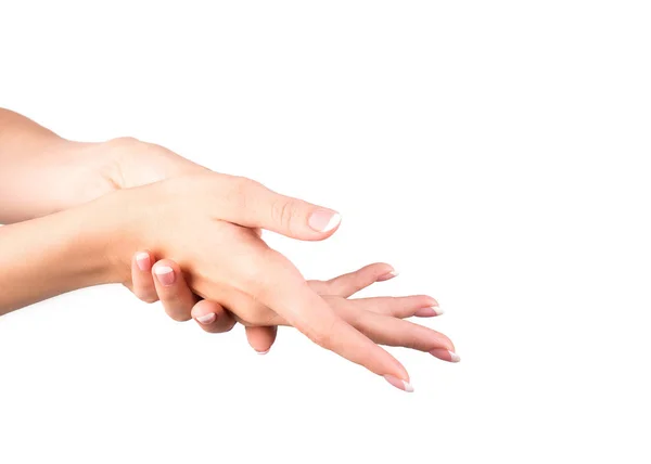 Female hands with french classic manicure. Woman wipes her hands, white background, closeup — Stock Photo, Image