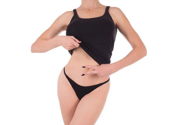 Kobieta przycięte dopasowanie do ciała w czarny podkoszulek i majtki, na białym tle. — Zdjęcie stockowe