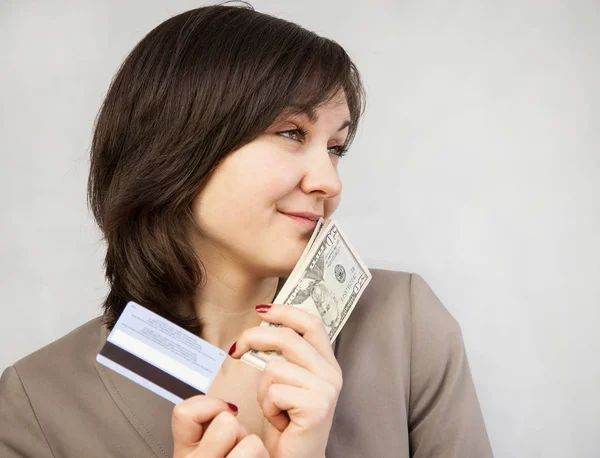 Businesswoman Holding Dollars Credit Card Grey Background — Stock Photo, Image