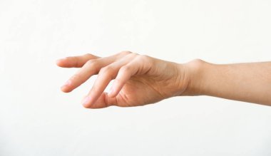 Female hand on a white background. Gesture of offer or request. clipart