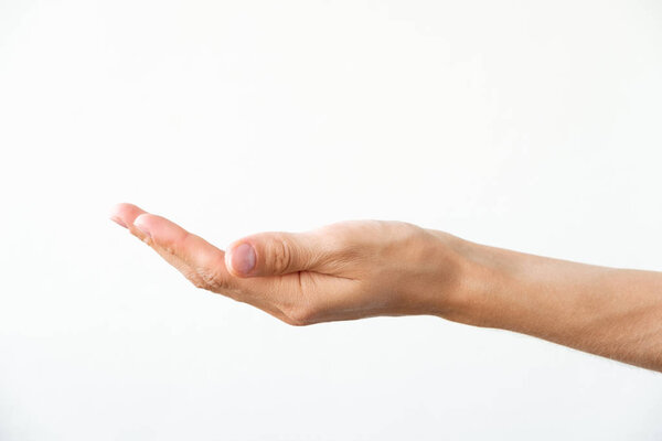 Female hand on a white background. Gesture of offer or request.
