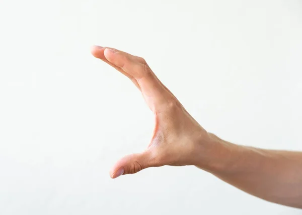 Vrouwelijke Hand Toont Enkele Afstand Size Witte Achtergrond — Stockfoto