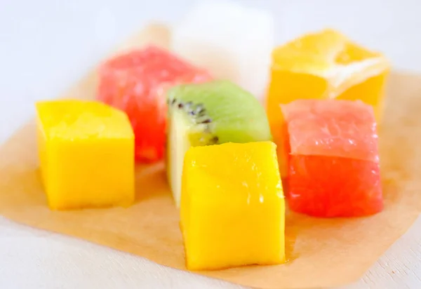 Fruit platter of cutting fruit and grapes, macro shot